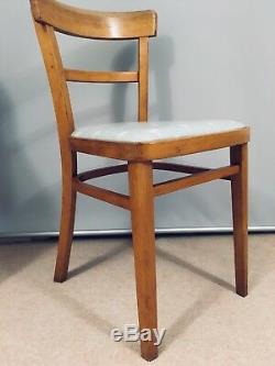 4 Mid Century kitchen Chairs recently upholstered with oil cloth
