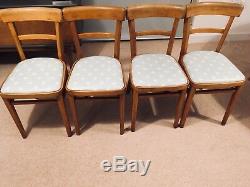4 Mid Century kitchen Chairs recently upholstered with oil cloth