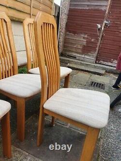 6 Oak Dining Chairs, (plus one needing repair), Beige fabric upholstery