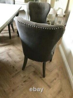 6 nearly new grey upholstered dining room chairs