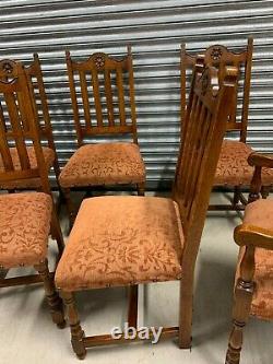 A Set of Eight Solid Oak Upholstered Dining Chairs by Royal Oak