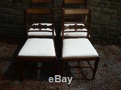 A set of four late victorian dining chairs. Upholstered in calico
