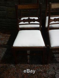 A set of four late victorian dining chairs. Upholstered in calico