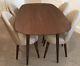 Bentley Designs Oslo Walnut Dining Table And 4 Linen Upholstered Chairs. Excelle