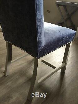 Blue velvet bespoke upholstered dining chairs, silver studs, light grey legs