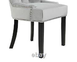 Dining Chair in light grey velvet with chrome knocker and Black Legs