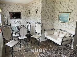 Dining /conservatory furniture- table with 8 chairs and matching 2 seater sofa