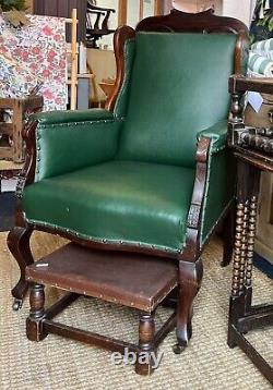 Edwardian Mahogany Wingback Armchair Later Upholstered In Bottle Green Leather