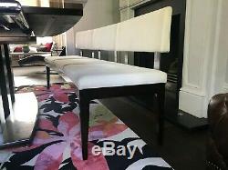 Extendable Selva dining table with upholstered dining chairs and bench seating