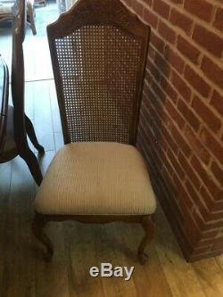Extending, solid wood, walnutt dining table & 6 chairs (recently re upholstered)