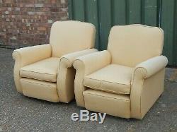 Fabulous pair of Victorian re-upholstered lounge armchairs with traditional arms