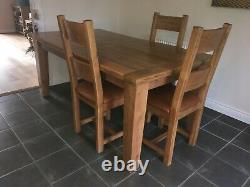 Farmhouse Solid oak extendable dining table with six leather upholstered chairs