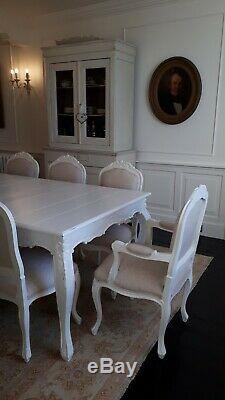 French set of 12 carved and upholstered dining chairs (table listed separately)