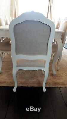 French set of 12 carved and upholstered dining chairs (table listed separately)