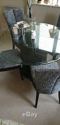 Glass Top Dining Table And 4 Upholstered Chairs In Grey And Black