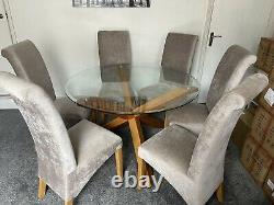 Glass top Wooden dining table and 6 matching Upholstered Grey Chairs