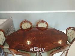 Italian Style Dining Room Table And 6 Chairs Upholstered In light green Material