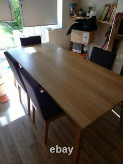 John Lewis Oak Stride extending dining room table and four upholstered chairs