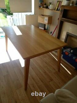 John Lewis Oak Stride extending dining room table and four upholstered chairs