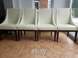Leather upholstered Sloping Chairs