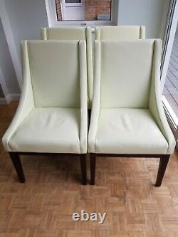 Leather upholstered Sloping Chairs