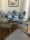 Long Rectangular Dining Table With Glass Top And 4 Upholstered Chairs
