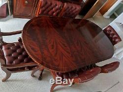 Mahogany Oval Dining Table and 6 Burgundy Upholstered Hide Chairs (2 carvers)