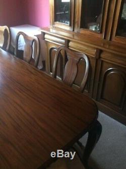 Mahogany Queen Anne style Dining Table and Eight Upholstered Chairs