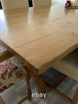 Oak Dining Table with six matching upholstered Chairs inc two Carver Chairs