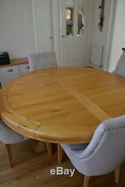 Oak Round Dining Table and 6 Upholstered Chairs