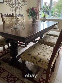 Old Charm Dark Oak dining table and 8 chairs (2 carvers) upholstered