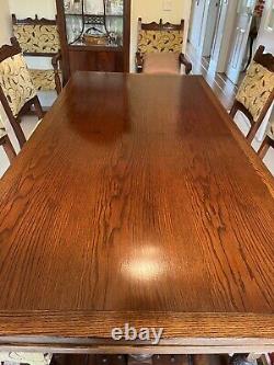 Old Charm Dark Oak dining table and 8 chairs (2 carvers) upholstered