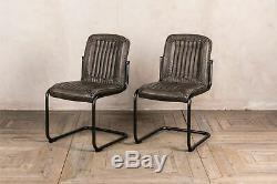 Pair Of Upholstered Dining Chairs In Vintage Grey Faux Leather Metal Frame