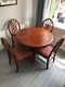 Round Extending Mahogany Dining Table + 4 Dining Upholstered Chairs