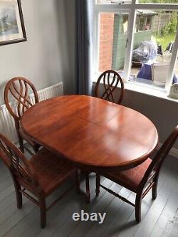 Round Extending Mahogany Dining Table + 4 dining upholstered chairs