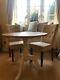 Round Oak Dining Table And 2 Upholstered Chairs