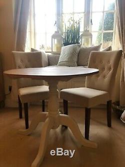 Round Oak Dining Table and 2 Upholstered Chairs