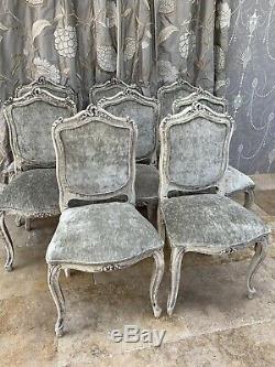 Set Of Eight French Carved Upholstered Dining Chairs