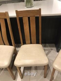 Set of 4 dining chairs used solid oak cream leather upholstery
