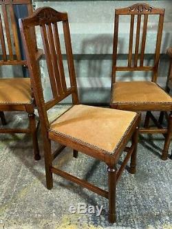 Set of 4x antique arts & crafts style solid oak upholstered dining chairs carver