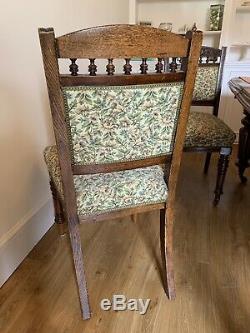 Six Antique Upholstered Dining Chairs with Carved Backs