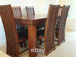 Solid Oak Dining Room table and 6 brown leather upholstered Dining Chairs