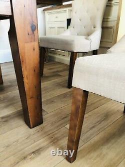 Solid Oak Dining Table and 6 Beige Linen Upholstered Chairs -Table Will Sit 8/10