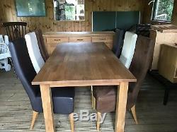 Solid Oak Dining Table, six Leather Upholstered Chairs And Oak Sideboard