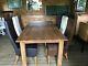 Solid Oak Dining Table, Six Leather Upholstered Chairs And Oak Sideboard