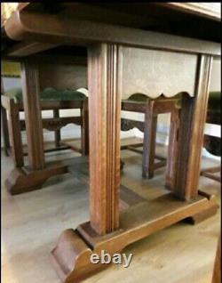 Solid Oak Extendable Dining Room Table with 6 Upholstered Carved Chairs