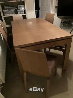 Solid Oak and Barley Veneer Extending dining table and 6 Upholstered chairs