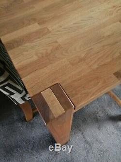 Solid oak dining table and 4 upholstered chairs
