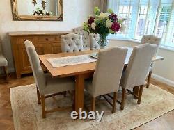 Solid oak dining table and upholstered chairs Laura Ashley fabric