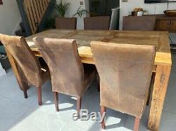 Solid wood dining table (reclaimed wood) and 6 soft Leather Upholstered chairs